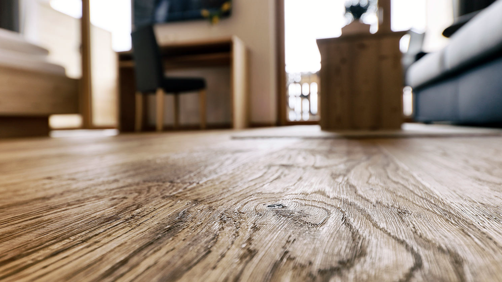 Rugged white oak hardwood flooring adds a personal touch to this classic home design.